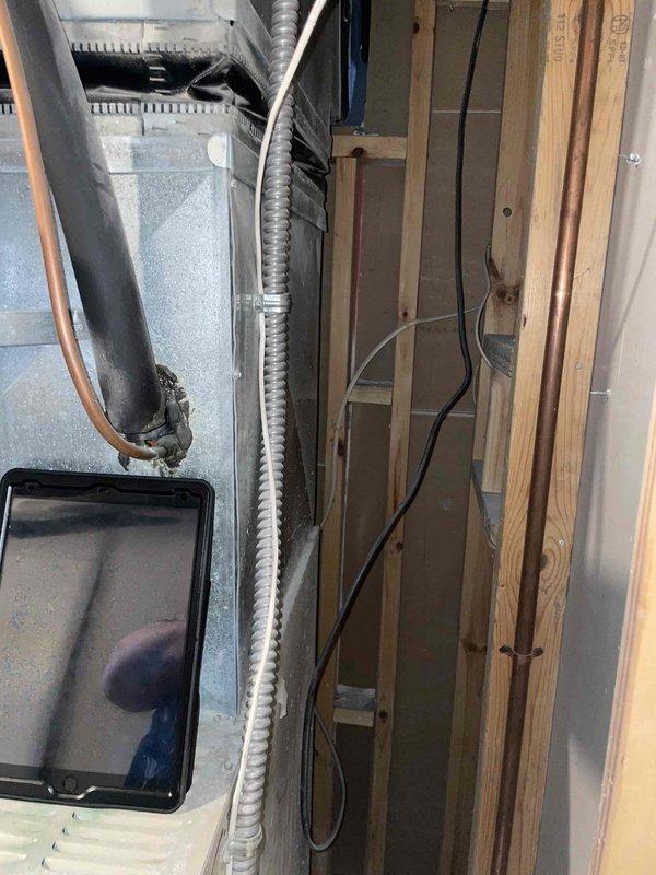 Provided comprehensive estimate for complete HVAC system replacement including air conditioning unit and natural gas furnace for 25-year-old equipment experiencing operational issues. Assessed existing basement-mounted furnace and outdoor condenser unit, documented current installation configuration including ductwork connections and electrical routing, and developed replacement specifications for new heating and cooling system.