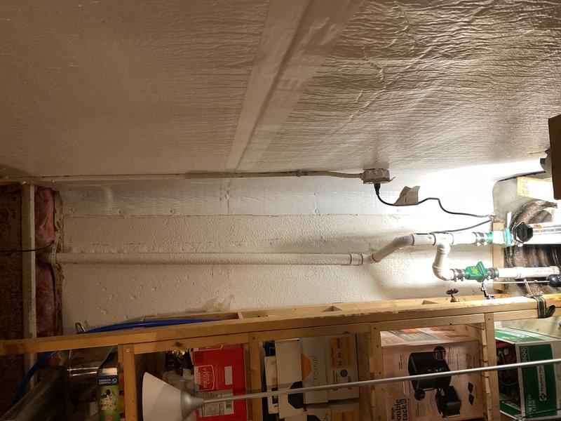 Responded to basement sump pump backup issue affecting drainage system. Upon inspection, identified backup sump pump malfunction in utility area. Evaluated existing primary and backup sump pump configuration, including discharge piping system with dual vertical PVC pipes mounted to foundation wall. Assessed pump operation, float switch functionality, and discharge line integrity. Addressed backup pump failure that had been present for 1-2 days, restoring proper secondary pump operation to ensure continued basement water protection. Verified both primary and backup systems operational, confirmed proper drainage flow through discharge lines, and tested system cycling under load conditions. Basement water management system returned to full operational status with redundant pump protection restored.