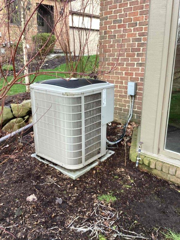 Responded to service call for second floor air conditioning unit experiencing short cycling issue where system would turn on and immediately shut off. Performed diagnostic evaluation on 15-year-old AC system with outdoor condensing unit located behind residence and air handler/coil assembly in basement. Presented equipment replacement estimate options to address the failing system and discussed timeline preferences with homeowner for installation scheduling.