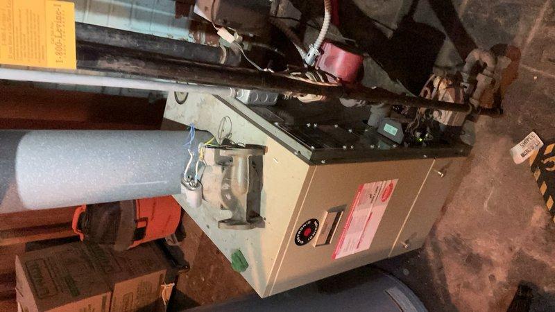 Completed preventive maintenance tune-up on 20+ year old HVAC system located in basement. Performed comprehensive inspection of furnace unit, verified operational status of all components including control panel and thermostat, examined copper plumbing connections and gas valve assembly for proper function and safety, and inspected ventilation piping and ductwork. All systems found to be operating within normal parameters at time of service.