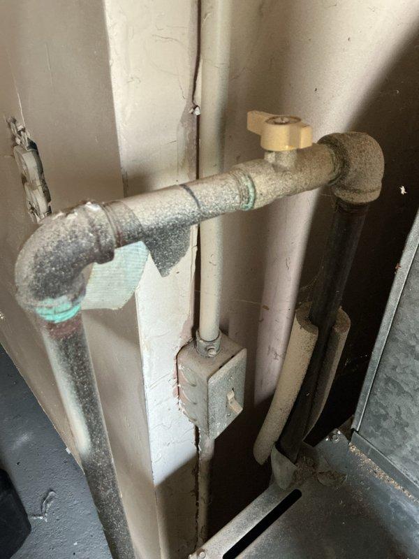 Completed preventive maintenance tune-up on basement-located furnace as first priority call. Performed comprehensive inspection of heating system, verified unit operational status, and documented existing conditions including aging insulated plumbing infrastructure and water heater in mechanical space. All components inspected and system confirmed functioning properly at time of service.