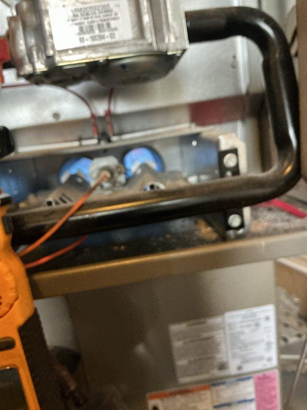 Completed comprehensive tune-up on ten-year-old furnace system. Performed full inspection of blower motor assembly, gas valve, and control components. Checked pressure readings across all gauges, inspected electrical connections and wiring integrity, and verified proper operation of all safety controls. Noted age-related surface corrosion on motor housing with no impact to performance. All components tested within normal operating parameters and system functioning efficiently.