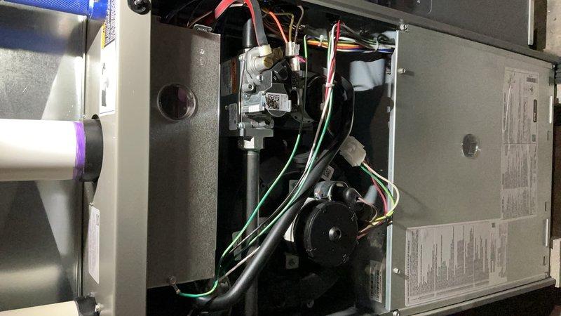 Completed comprehensive Gold Furnace Inspection and tune-up service for two residential furnace systems at separate properties. The first unit, a new installation requiring its initial mechanical annual inspection, was thoroughly examined with all internal components, electrical connections, gas valve assembly, ignition system, and blower motor verified for proper operation and manufacturer specifications. The second furnace, an 18-20 year old system, received complete maintenance service including inspection of all mechanical and electrical components, burner assembly, heat exchanger, blower motor operation, and safety controls. Both units located in basement installations showed proper venting configurations with copper gas line connections, shut-off valves, and pressure relief systems in place. All wiring connections were inspected and found secure, control boards functioning correctly, and flame sensors clean. Documentation photos captured for service records showing internal compo