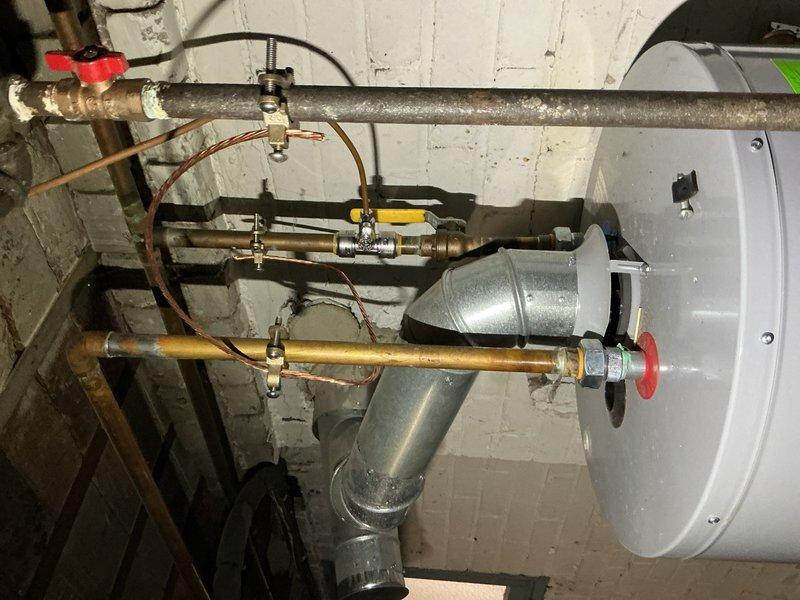 Completed comprehensive Gold Furnace Inspection and tune-up service for two residential furnace systems at separate properties. The first unit, a new installation requiring its initial mechanical annual inspection, was thoroughly examined with all internal components, electrical connections, gas valve assembly, ignition system, and blower motor verified for proper operation and manufacturer specifications. The second furnace, an 18-20 year old system, received complete maintenance service including inspection of all mechanical and electrical components, burner assembly, heat exchanger, blower motor operation, and safety controls. Both units located in basement installations showed proper venting configurations with copper gas line connections, shut-off valves, and pressure relief systems in place. All wiring connections were inspected and found secure, control boards functioning correctly, and flame sensors clean. Documentation photos captured for service records showing internal compo