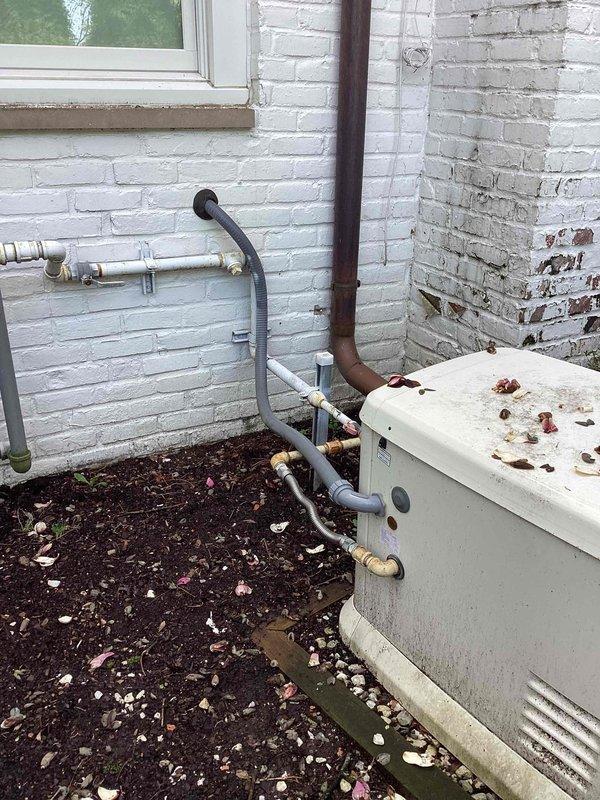 Conducted site assessment for relocating existing generator approximately 35 feet into backyard area. Evaluated current utility locations, including gas lines marked on ground, existing HVAC equipment placement, and utility infrastructure along building exterior. Documented site conditions, including fence line clearances, tree placement, underground utility markings, and existing electrical and gas service routing to determine optimal relocation path and new generator placement location.