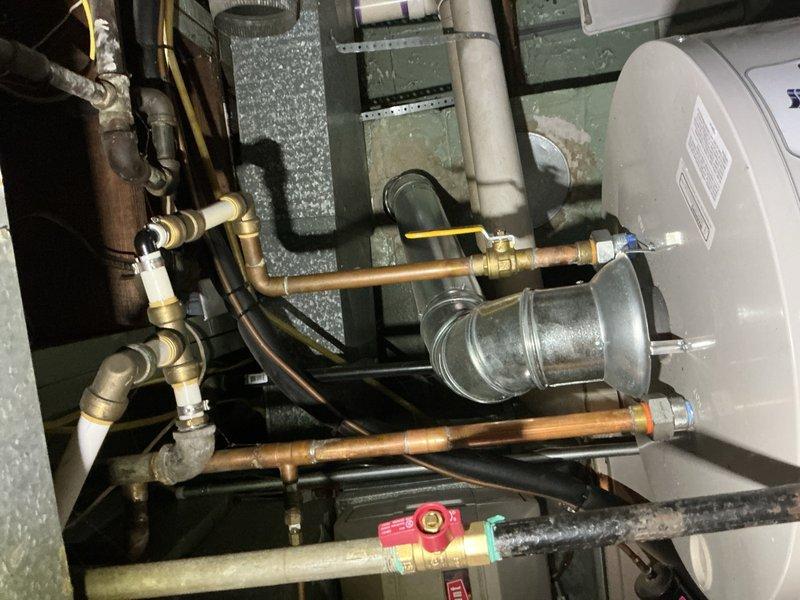 Completed comprehensive Gold Furnace Inspection on basement-located heating system under 10 years old. Performed full system diagnostics including gas pressure testing, heat exchanger examination, and blower motor operation verification. Inspected all electrical connections, gas valve assembly, and safety controls. Evaluated combustion air supply, venting system integrity, and condensate drain assembly with trap. Checked temperature differential across heat exchanger, confirmed proper airflow, and tested thermostat operation. Examined auxiliary equipment including water heater connections and associated plumbing components. Documented system specifications and captured detailed images of mechanical installation, control wiring, and internal components. All safety devices tested and confirmed operational. System operating within manufacturer specifications with no immediate service concerns identified. Unit confirmed in good working condition and ready for heating season.