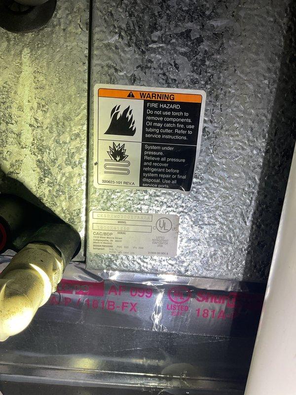 Completed comprehensive Gold AC Inspection and tune-up service on two outdoor condensing units. Performed standard maintenance procedures including inspection of refrigerant system components, verification of proper system pressures, examination of electrical connections, and assessment of overall unit operation. Inspected and documented air filtration system condition, noting pleated media filter with visible dust accumulation in return air compartment. Reviewed manufacturer safety labels and system specifications on outdoor equipment, confirming proper warning placards present regarding refrigerant handling and fire hazards. Both AC systems operational at time of service completion with no immediate repairs required.