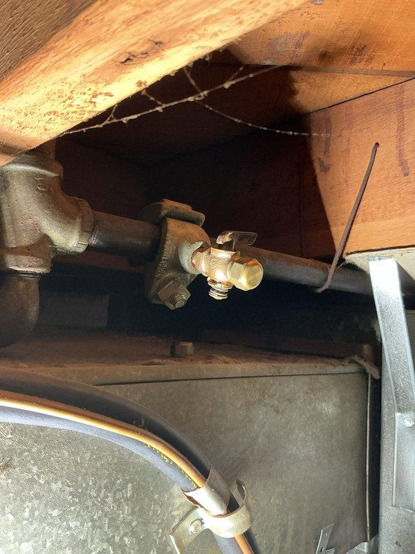 Removed existing soft copper gas line and properly capped the connection point. Installed approximately 10-15 feet of new 1/2" black iron gas pipe to code specifications, incorporating an AGA-approved gas shutoff valve and appliance flex connector for safe appliance connection. All gas piping was securely anchored to structural joists using appropriate hangers and brackets to prevent movement and ensure long-term stability. Additionally, installed 4" rigid metal vent pipe with proper routing and termination, including a new 4" exterior vent hood to provide adequate exhaust ventilation for the dryer appliance.