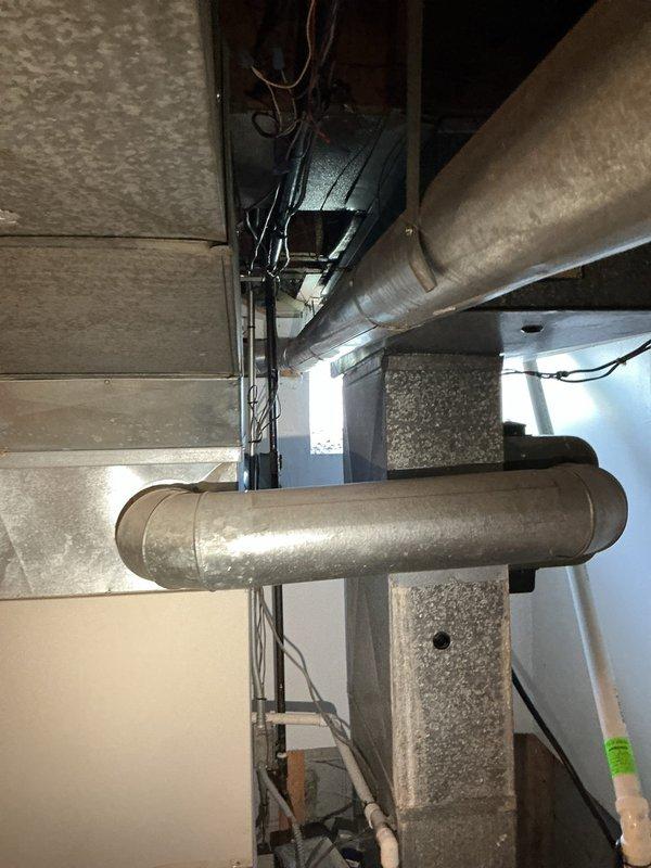 Responded to low water pressure complaint at kitchen faucet where homeowner had attempted gasket replacement and discovered black sediment debris. Upon inspection, identified deteriorated internal faucet components and sediment accumulation causing flow restriction. Disassembled faucet assembly, flushed supply lines to remove remaining particulate matter, and replaced worn gasket and cartridge components. Restored proper water pressure and verified no leaks at connections.