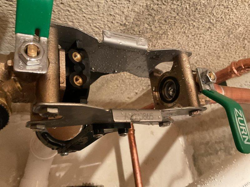 Responded to service call for sump pump system cycling issue where unit was running frequently but shutting off after 5-10 seconds of operation. Inspected water-powered backup sump pump with primary pump installation from May 2025. Examined all plumbing connections, including copper supply lines, PVC discharge piping, and brass fittings at wall-mounted valve assembly. Verified proper installation of backup system components and checked for potential causes of short cycling including float switch malfunction, check valve issues, or pressure imbalances in the water-powered ejector system. Assessed sump basin configuration with multiple inlet pipes and confirmed electrical connections to primary pump. Documented existing installation with spray foam insulated walls and multi-pipe configuration serving the dual pump system.