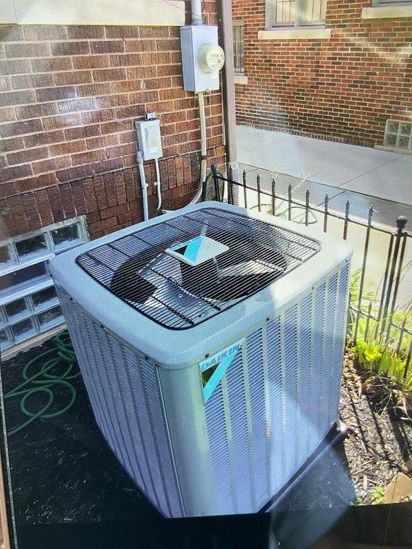 Completed comprehensive Gold AC Inspection on a 6-year-old residential air conditioning system with air handler located in basement. Performed full system evaluation including inspection of outdoor condenser unit, verified proper electrical connections and conduit integrity, assessed air filter condition (20x30x1), confirmed adequate clearance around condenser unit, and documented equipment operation. System found operating within normal parameters with no immediate service needs identified.