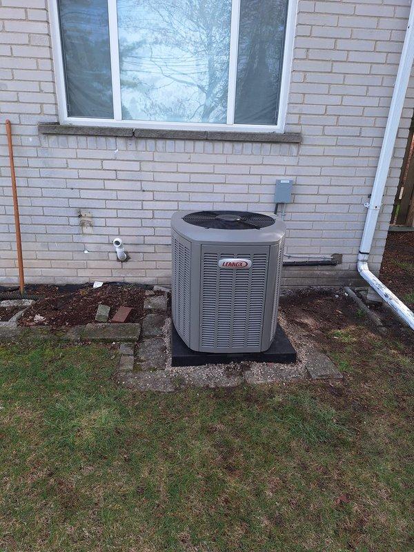 Completed full HVAC system installation including a 70,000 BTU Lennox furnace and 2.5 ton Lennox air conditioning unit with rear discharge configuration. Installed new thermostat, humidifier, and reconnected existing equipment. Obtained mechanical and electrical permits, verified all components operational, and confirmed system qualifies for utility rebate programs with AHRI certificate number 215663885.