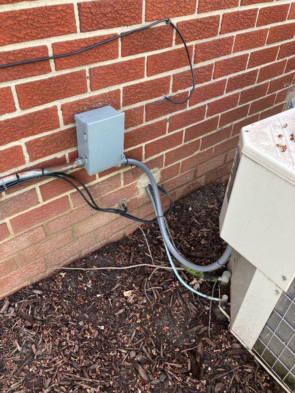 Provided estimate for complete air conditioning system replacement. Existing 2007 system was non-functional with complete R22 refrigerant loss as previously diagnosed by another contractor. Assessed outdoor condensing unit located against brick exterior and basement furnace installation to determine replacement specifications and compatibility requirements for new equipment.