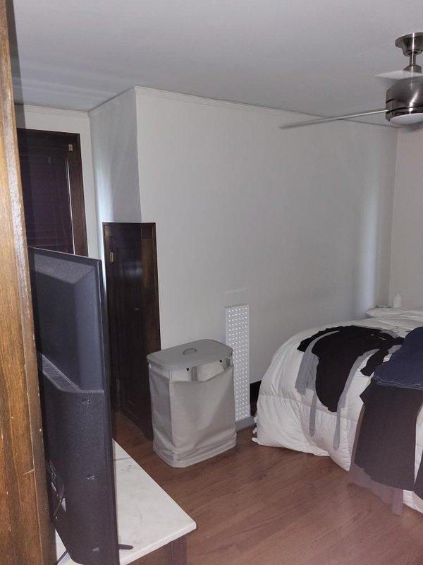 Conducted site evaluation for new mini-split system installation in residential property. Assessed bedroom and adjacent living spaces to determine optimal placement for indoor air handler units and identify routing requirements for refrigerant lines and condensate drainage. Documented existing conditions and provided customer with contact information for follow-up consultation regarding equipment specifications and installation scope.