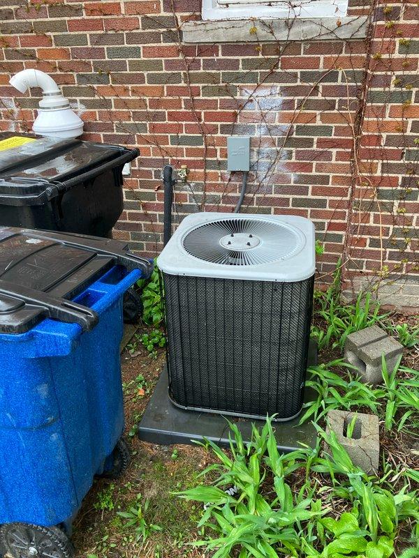 Provided estimate for replacement of non-operational 7-year-old air conditioning system with outdoor condenser unit located against exterior brick wall and York furnace system installed in basement. Evaluated existing equipment configuration including PVC venting, refrigerant lines, condensate drainage, and electrical connections to determine replacement specifications and installation requirements.