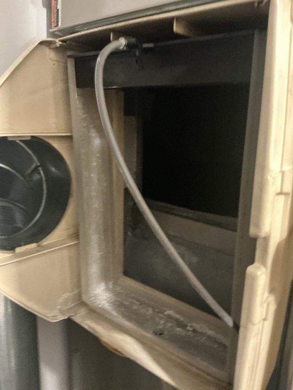 Responded to service call for non-operational humidifier in first-floor furnace room. Upon arrival, inspected 15-year-old Aprilaire Model 560 whole-house humidifier attached to furnace system. Unit was found to be marked "NOT IN USE" and confirmed non-functional. Documented existing conditions with photos showing humidifier installation and internal HVAC components. Verified furnace heating and cooling systems remain fully operational and independent of humidifier issue. Advised customer on humidifier status and discussed options for repair or replacement given age of unit.