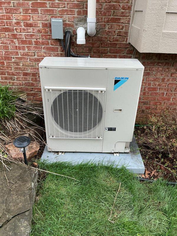 Completed comprehensive spring tune-up on a four-year-old Daikin outdoor condensing unit located on the south side of the residence. Performed full system inspection including refrigerant line assessment, electrical connection verification, condenser coil cleaning, and operational testing to ensure optimal cooling performance for the upcoming season.