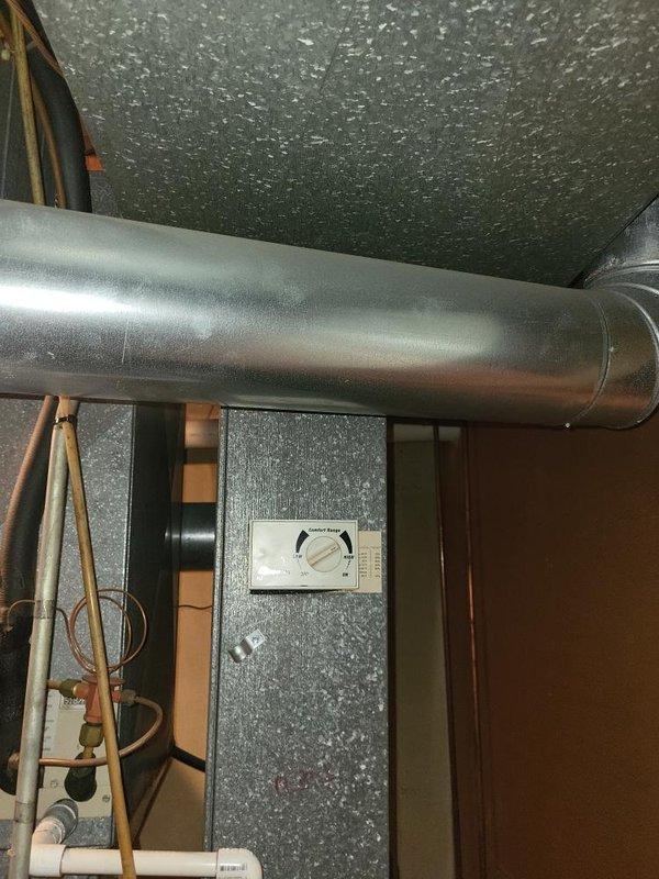 Conducted comprehensive assessment of existing 1997 HVAC system for replacement estimate, including natural gas furnace located in basement and air conditioning unit positioned outside. Evaluated current equipment condition, operational status, and installation environment including ductwork configuration, utility room layout, and accessibility for future replacement. Documented system specifications, clearance requirements, and existing infrastructure including venting, electrical connections, and condensate drainage to develop complete replacement proposal for both heating and cooling equipment.