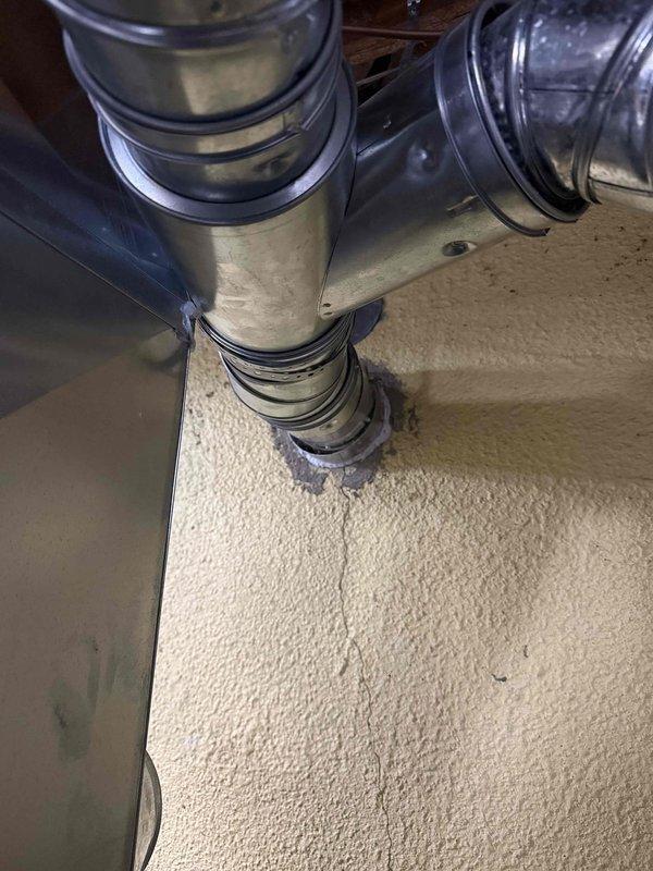 Responded to emergency water leak call for leaking water heater. Upon arrival, immediately shut off water supply to prevent further water damage. Inspected 50-gallon water heater and confirmed active leak requiring unit replacement. Documented existing equipment configuration including water heater installation, connected plumbing lines, and adjacent HVAC furnace system. Photographed mechanical room setup showing water heater condition, copper and black supply/discharge piping, ductwork assembly, and overall utility space layout. Provided estimate for replacement with new 50-gallon short water heater. Customer advised of findings and replacement options.