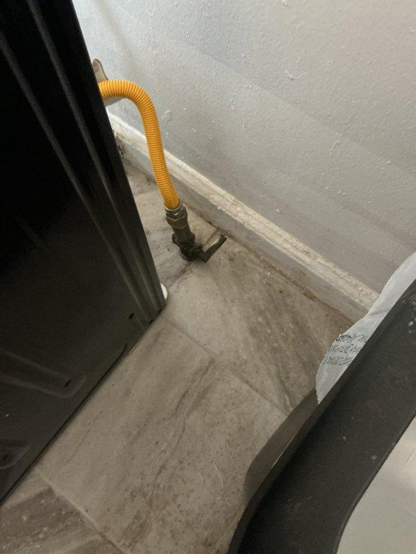 Responded to gas leak call in basement with gas system currently shut off. Located and isolated leak point on aging gas line infrastructure over ten years old. Performed pressure test on gas system to verify leak location and ensure system integrity. Completed repairs and restored safe gas service to residence. Documented conditions with photos showing basement piping configuration and gas appliance connections.