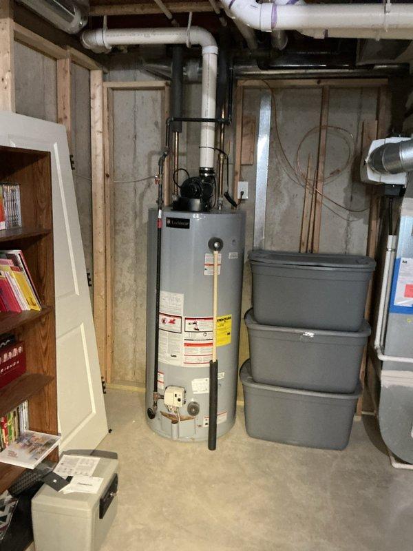 Responded to service call for non-operational sump pump system. Upon arrival, performed diagnostic assessment of the sump pump assembly and associated discharge plumbing. Inspection revealed heavily corroded elbow joint connection and deteriorated PVC discharge piping with significant mineral deposits and debris accumulation. The corroded fitting was compromising system integrity and preventing proper pump operation. Replaced failed components including the corroded elbow joint with new SurePro fittings to restore proper drainage function. Tested system operation to verify pump cycling and discharge flow were functioning correctly. System returned to full operational status.