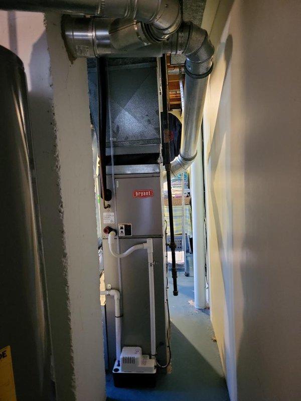 Responded to service call for non-operational furnace in basement mechanical room. Upon arrival, confirmed eight-year-old heating unit had completely failed and was not producing heat. Conducted thorough assessment of existing Bryant furnace system, including evaluation of ductwork connections, condensate drainage lines, and overall HVAC infrastructure. Documented current equipment configuration with existing water heater placement and utility corridor layout. Prepared comprehensive replacement estimate for new furnace installation, accounting for existing duct connections, PVC venting requirements, and proper clearances in mechanical room. Provided customer with detailed quote for complete furnace replacement to restore heating functionality to residence.