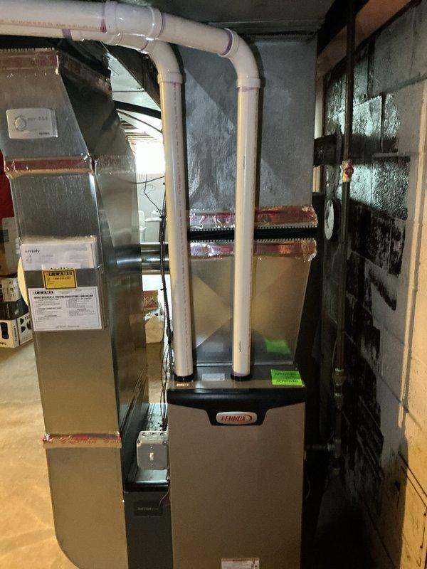 Responded to service call for non-operational air conditioning system on 10+ year old equipment. Conducted comprehensive inspection of outdoor condenser unit and indoor coil assembly located in basement alongside recently installed Lennox furnace. Evaluated electrical connections, refrigerant lines, condensate drainage system, and overall system functionality to determine equipment condition and provided replacement estimate for aging AC system.