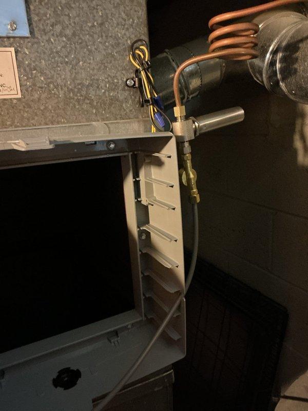 Installed small bypass duct assembly on existing HVAC system to regulate airflow and prevent excessive static pressure buildup. Routed copper refrigerant lines and secured connections to air handler unit, completing installation with proper electrical terminations and system testing to ensure optimal operation.