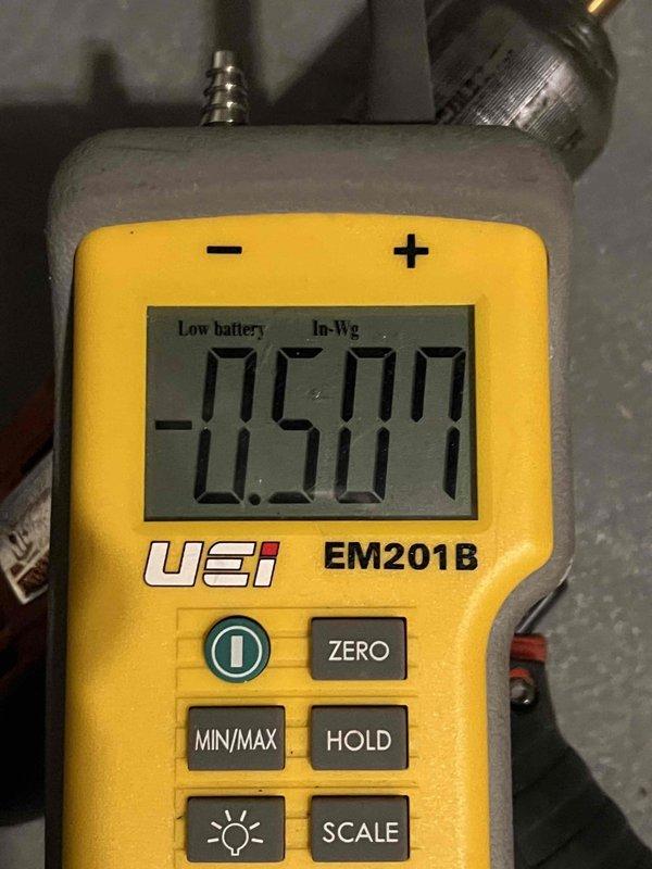 Responded to no-heat call for 8-year-old furnace located in basement. Upon arrival, performed diagnostic testing using digital manometer to measure pressure switch operation and verify proper draft inducer function. Initial pressure readings showed -0.501 In-Wg and +0.041 In-Wg, indicating potential issues with pressure switch circuit or draft inducer performance. Conducted systematic troubleshooting of ignition sequence and safety controls to identify root cause of failure to start. Verified all electrical connections, tested pressure switch functionality, and inspected venting system for proper operation.