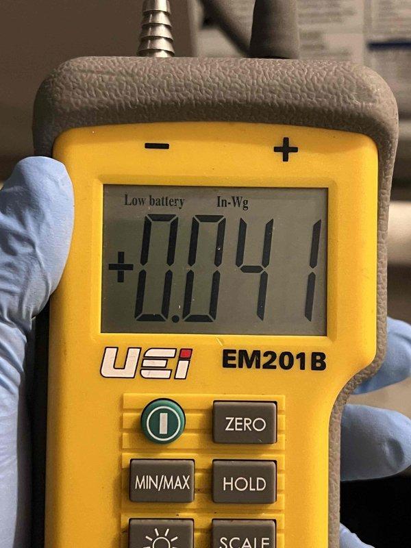 Responded to no-heat call for 8-year-old furnace located in basement. Upon arrival, performed diagnostic testing using digital manometer to measure pressure switch operation and verify proper draft inducer function. Initial pressure readings showed -0.501 In-Wg and +0.041 In-Wg, indicating potential issues with pressure switch circuit or draft inducer performance. Conducted systematic troubleshooting of ignition sequence and safety controls to identify root cause of failure to start. Verified all electrical connections, tested pressure switch functionality, and inspected venting system for proper operation.