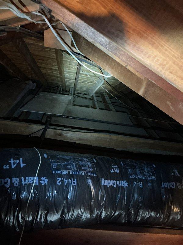 Conducted comprehensive site assessment for natural gas line installation to multiple appliances in newly occupied residence. Evaluated existing gas infrastructure and determined routing requirements for gas lines to kitchen range, fireplace, and outdoor BBQ location. Inspected garage area and attic space to identify optimal pipe pathways, noting existing utility runs and structural considerations for new gas piping installation.