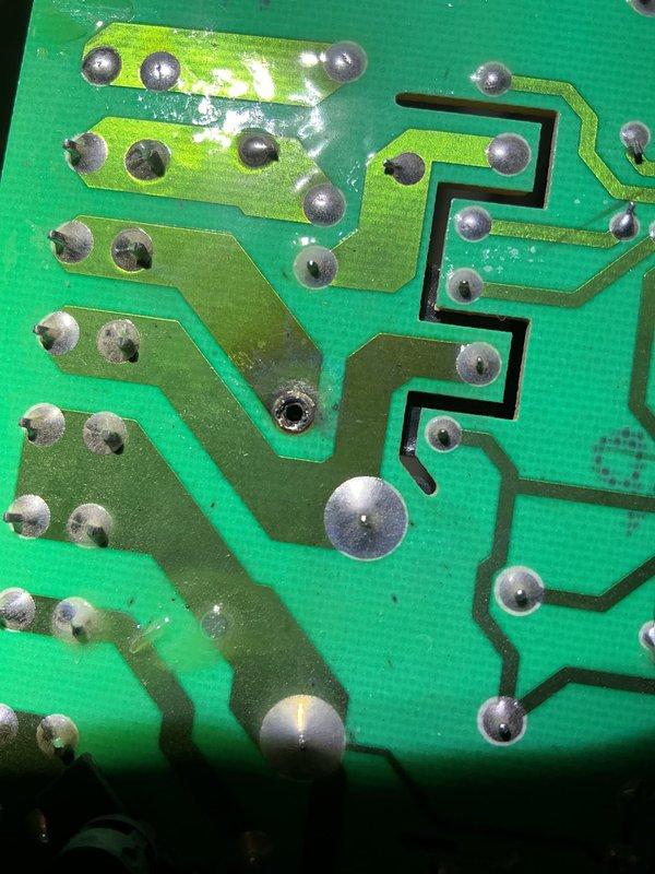 Responded to no-heat call for 5-year-old furnace located in basement. Upon inspection, identified failed control board as cause of system failure. Control board showed visible signs of component degradation and discoloration on circuit traces, preventing proper furnace operation. Documented board condition with detailed photos showing damaged PCB surface, compromised solder joints, and deteriorated electronic components. Explained findings to homeowner and provided options for repair or replacement of control board to restore heating functionality.