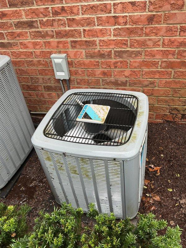 Returned to property to perform leak search following initial system re-diagnosis. Inspected both AC units located on side of home, confirmed both systems operational with no refrigerant leaks detected at time of inspection. Verified proper operation of indoor air handler and outdoor condensers, documented equipment condition with photos showing normal wear patterns and proper installation of refrigerant lines and electrical connections.