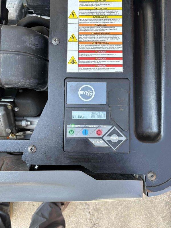 Performed scheduled maintenance on a 16KW Honeywell standby generator per maintenance plan requirements. Inspected control panel SYNC display, verified battery status, and confirmed all operational indicators functioning properly. Examined air filter element showing previous service notation, checked engine oil level, inspected fuel system connections and hoses for leaks or deterioration, and verified all safety labels and warnings intact. Unit operating normally with no issues found; maintenance plan renewal processed on-site.