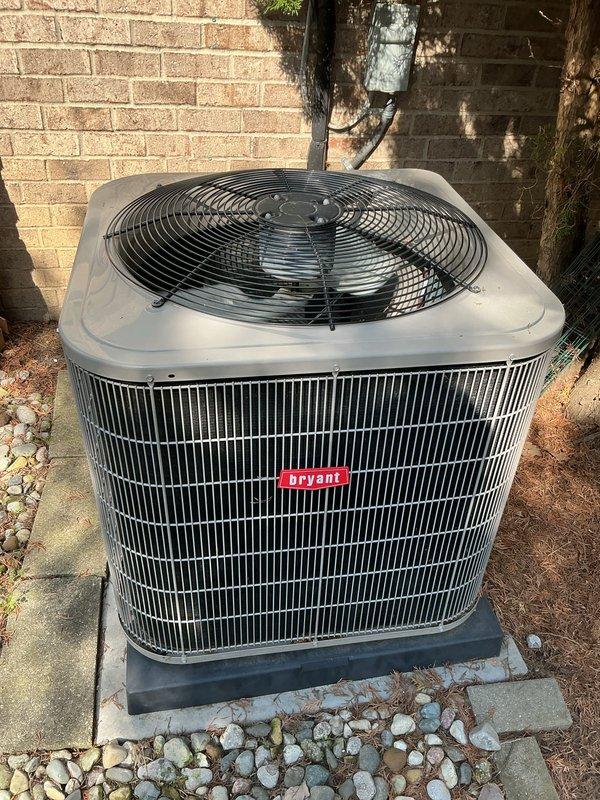 Completed comprehensive Gold AC Inspection on a 5-year-old Bryant air conditioning system with air handler located in basement. Performed thorough examination of outdoor condenser unit, verified proper operation of compressor and fan motor, inspected electrical connections and disconnect box, checked refrigerant levels and system pressures, cleaned condenser coils, and assessed overall system performance. Unit found in good working condition with no immediate service needs identified, all components operating within manufacturer specifications.