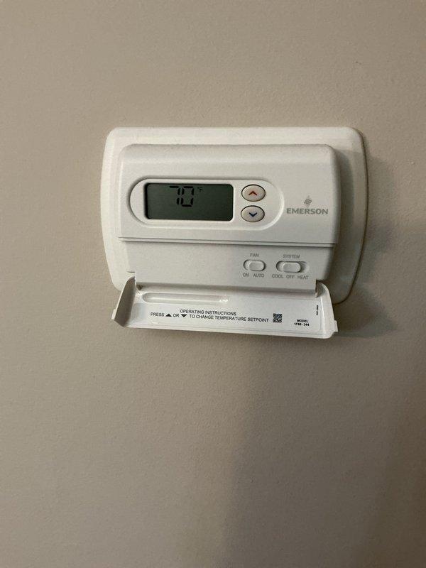 Responded to service call for non-operational Lennox furnace in basement mechanical room following water intrusion from recent plumbing leak. Performed complete system inspection of furnace, ductwork, and Emerson thermostat to assess water damage and verify operational status. Documented equipment condition with photographic evidence showing furnace, air handler, and associated components in utility room setting.