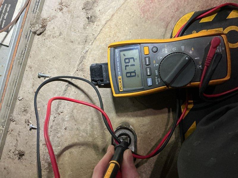Completed comprehensive furnace inspection on 10+ year old unit located in basement. Performed electrical diagnostics using digital multimeter to verify proper voltage and amperage readings, inspected blower motor assembly and control board for proper operation, and checked all electrical connections. Inspection included evaluation of humidifier, thermostat functionality, and hot water tank as requested.