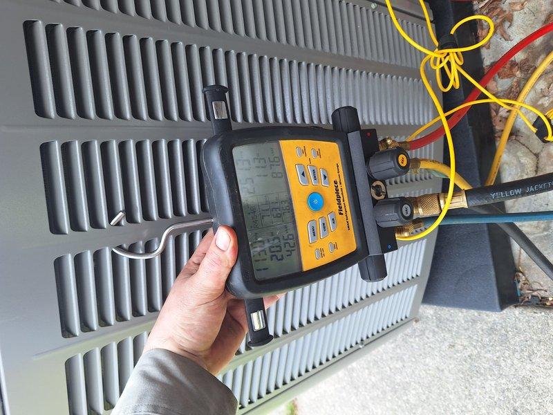 Completed installation of 2.5 ton Lennox air conditioning unit with matching evaporator coil on left side of residence. Unit was set on rubber isolation pad, refrigerant lines and electrical conduit were run and connected, and system was tested and verified operational using diagnostic equipment. Mechanical permit was requested for the installation.