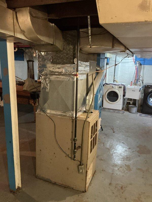 Completed plumbing inspection and assessment of basement utility area. Water heater and associated copper piping connections were examined and photographed for documentation purposes. All mechanical systems, including HVAC unit and related ductwork, were visually inspected to ensure proper operation and identify any potential service needs.