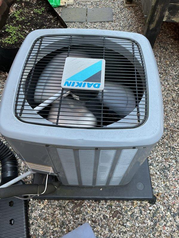 Completed comprehensive Gold-level inspection on multi-unit HVAC system with equipment aged 5-10+ years. Performed thorough examination of furnace components including blower motor assembly, burner tray, gas valve controls, and all electrical connections; verified proper operation of all internal mechanical systems and confirmed adequate airflow through ventilation components. Inspected outdoor Daikin condenser unit, evaluated cabinet condition, verified fan operation, and assessed refrigerant lines and overall system performance; documented equipment condition with detailed photography for maintenance records.