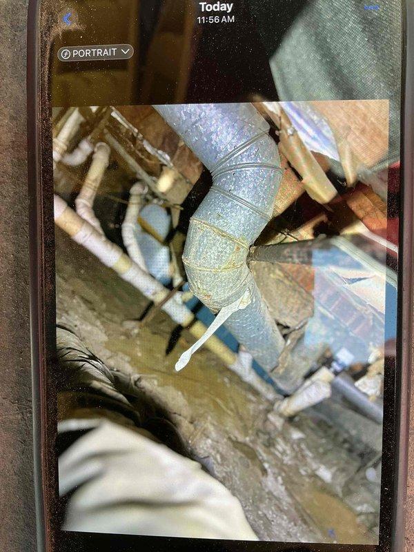 Responded to no heat call for furnace located in crawl space. Upon arrival, found pilot light extinguished on gas furnace. Inspected unit and verified gas supply, thermocouple condition, and pilot assembly functionality. Successfully relit pilot light and confirmed proper ignition sequence and burner operation. Observed evidence of moisture accumulation on adjacent ductwork and mechanical components in crawl space environment. Verified furnace cycling properly with adequate airflow and proper combustion. System restored to normal heating operation.