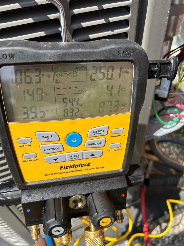 Completed air conditioning system startup on Lennox outdoor condensing unit. Performed comprehensive system diagnostics using refrigerant manifold gauges, verified operating pressures at 67 psig low side and 251 psig high side, confirmed superheat readings at 148°F, and ensured all electrical connections and refrigerant lines were properly secured and functioning within manufacturer specifications.