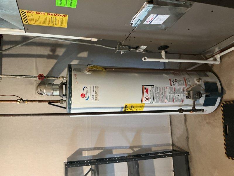 # HVAC Maintenance - Gold AC Inspection

Performed comprehensive seasonal tune-up and startup service on a 15-year-old air conditioning system located in basement mechanical room. Conducted multi-point inspection including refrigerant level verification, electrical connection testing, condensate drain line evaluation, and air filter assessment. Inspected evaporator coil condition and verified proper airflow throughout system. Tested thermostat operation and calibration to ensure accurate temperature control. Examined all accessible ductwork connections for air leaks and proper insulation. Verified compressor operation and measured amp draw to confirm equipment running within manufacturer specifications. Cleaned condenser coil and checked fan motor operation. Inspected all safety controls and limit switches for proper function. Lubricated all accessible moving parts as required by manufacturer guidelines. Measured temperature differential across evaporator coil to verify adequate coolin