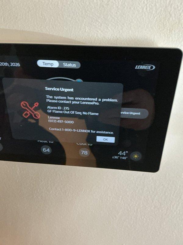 Responded to thermostat service alert displaying Alarm ID 275 "GF Flame Out Or Seq No Flame" error on Lennox digital thermostat. Diagnosed furnace control board and gas valve failure causing flame sequencing issue. Replaced defective control board and gas valve assembly under warranty PO 1314928-001. Verified proper ignition sequence, flame sensor operation, and system functionality. Cleared error codes and confirmed thermostat communication with furnace. System restored to normal heating operation.