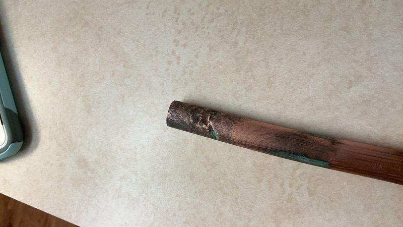 Completed floor break repair to access and replace heavily corroded copper water supply lines. Removed deteriorated piping exhibiting significant oxidation, verdigris formation, and rust deposits throughout the affected section. Installed new copper piping to restore proper water flow and prevent future leaks from corroded connections.