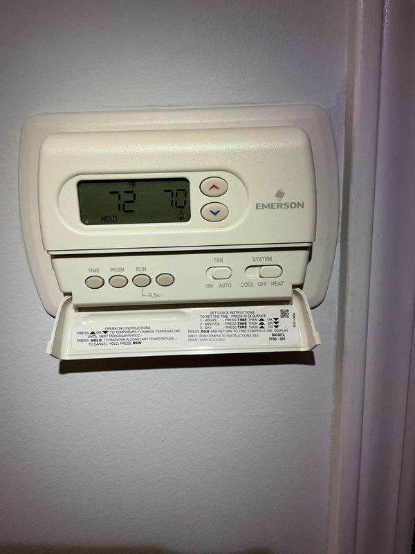 Completed Gold AC Inspection on 4-year-old Bryant HVAC system with basement-located air handler. Performed comprehensive evaluation of furnace unit, verified proper operation of Emerson programmable thermostat displaying 72°F setpoint, inspected ductwork connections and plenum assembly. Examined condensate drain lines, PVC venting system, wall-mounted expansion tank, and auxiliary equipment. All system components found operating within normal parameters. Unit confirmed functional with no immediate service requirements identified.