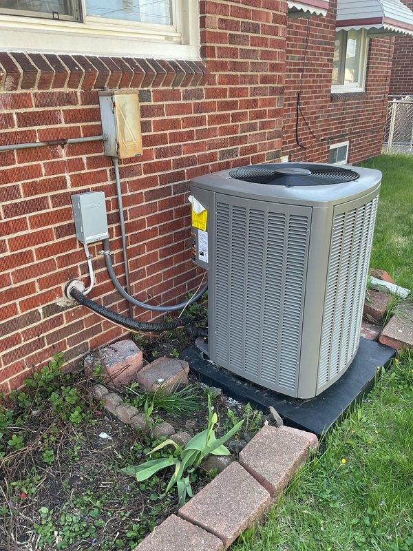 Performed AC system startup on outdoor condensing unit located at basement level. Connected Fieldpiece diagnostic manifold gauges and verified refrigerant pressures and temperatures within manufacturer specifications. Inspected electrical connections at disconnect boxes, refrigerant line sets, and outdoor unit. System operational and cooling properly. Customer inquiry regarding property violation requires follow-up discussion.