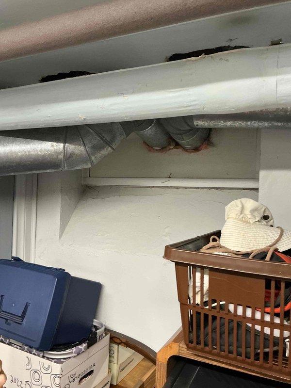Completed Gold AC Inspection on multi-unit system with two zones servicing basement and upstairs locations. Equipment is approximately 6 years old and operational at time of inspection. Performed comprehensive maintenance evaluation of outdoor condenser unit and indoor air handlers per gold service protocol. Inspected outdoor unit fan assembly, verified proper operation, and noted environmental debris accumulation on fan guard requiring attention. Evaluated basement ductwork installation, mounting integrity, and associated plumbing connections. Documented system condition through photographic evidence showing outdoor condenser positioned in landscaped area and basement mechanical infrastructure with horizontal duct runs and support brackets. All inspection points completed in accordance with manufacturer specifications and industry standards for preventative maintenance service.