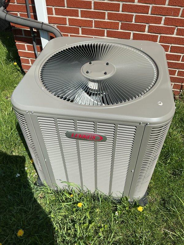 Completed comprehensive Gold AC inspection on 3-year-old Lennox residential air conditioning system with outdoor condenser unit and basement-located air handler. Performed thorough visual inspection of condenser unit, verified proper fan operation, checked refrigerant levels, inspected electrical connections, cleaned condenser coils, and evaluated overall system performance. Unit found to be in excellent operating condition with no deficiencies noted; all components functioning within manufacturer specifications.
