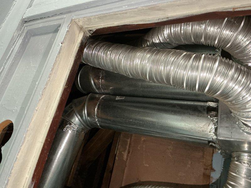 Performed diagnostic evaluation on 10+ year old furnace located in first floor closet. Conducted thorough system inspection and testing to assess reported operational issues. Determined pressure switch requires replacement based on diagnostic findings. Documented equipment condition with photographs showing air handler unit, flexible aluminum ductwork, cylindrical muffler component, and associated electrical connections. Provided repair quote to homeowner for pressure switch replacement and related corrective work needed to restore proper furnace operation.